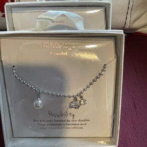 Stocking stuffers/ bracelets with little charms and I have 3 available
